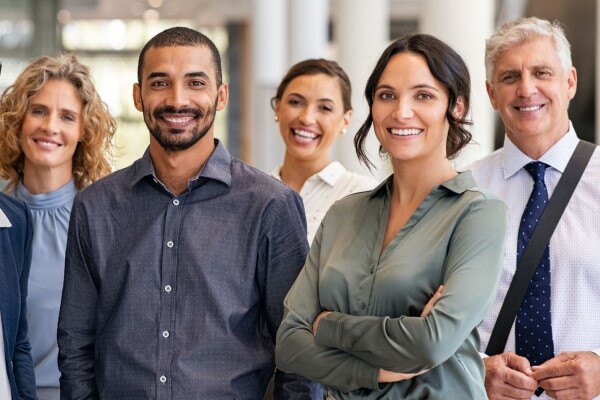 A group of people smiling